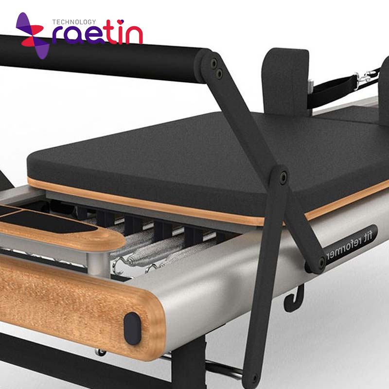pilates reformer with beech wooden and stainless steel
