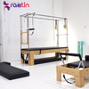 Pilates beech and stainless steel pilates reformer with full trapeze