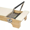 Compact wooden reformer for small spaces