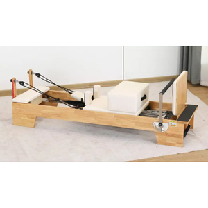 Pilates exercises using rubber wood bed