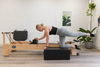 Enjoy Pilates Physio on a Full Slide Track Small White Bed